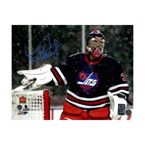 Connor Hellebuyck Winnipeg Jets Autographed Heritage Classic Snow Blue Pen 11x14 Photo - Fan Cave COA